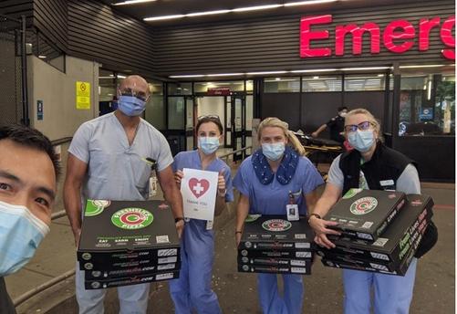 Corwin Kwan delivers pizzas to Vancouver hospitals