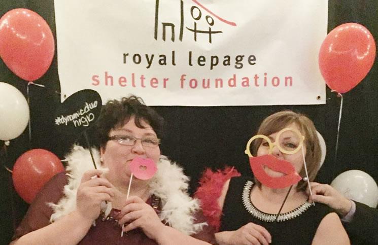 Sales reps Roberta Primmer and Karen Pomeroy host Masquerade Ball for shelter