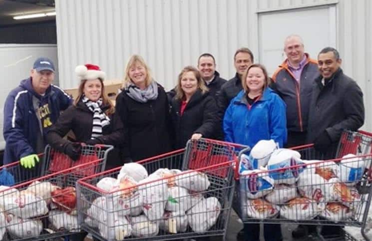 Kingston and Area Real Estate Association members deliver more than 200 turkeys to food bank