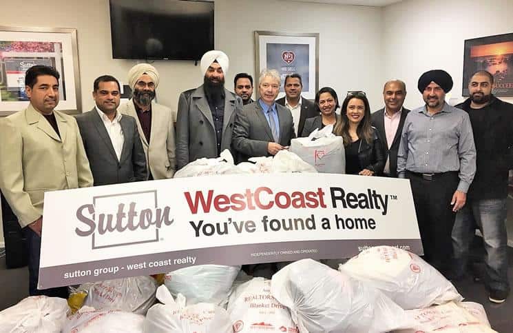 Sales rep Baljit Singh Sandhu helps with Realtors Care Blanket Drive in Surrey