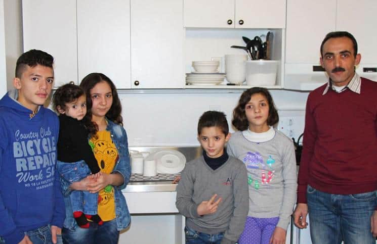 Syrian refugee families helped by Realtors at Welcome Place in Winnipeg