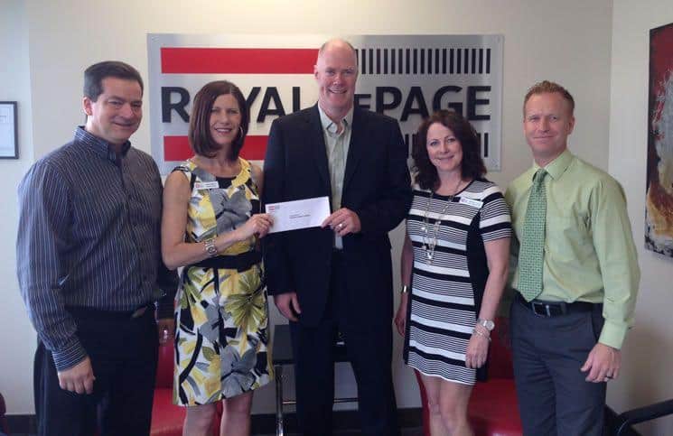 Royal LePage Kelowna agents donate more than $11,000 to local women’s shelter