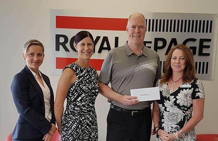 Royal LePage Kelowna raises $8,700 for women’s shelter