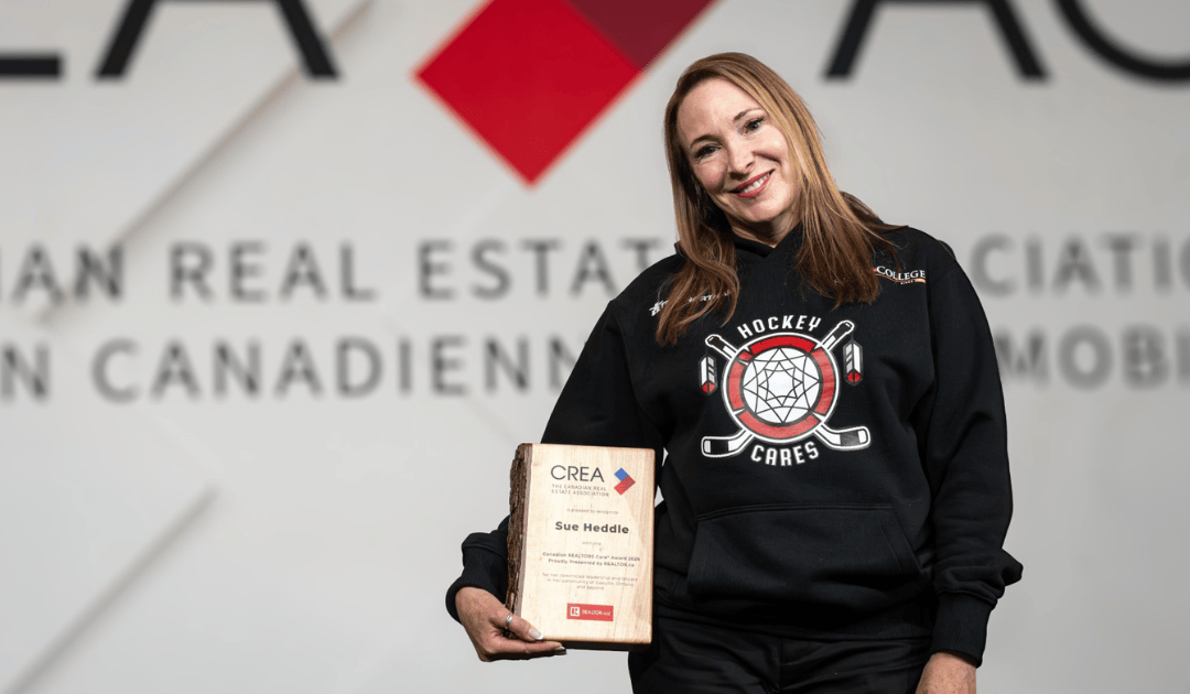Sue Heddle wins Canadian Realtors Care Award for youth hockey program